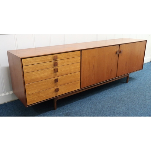 2102B - A MID 20TH CENTURY TEAK KOFOD LARSEN FOR G PLAN SIDEBOARD with bank of five graduating drawers along... 