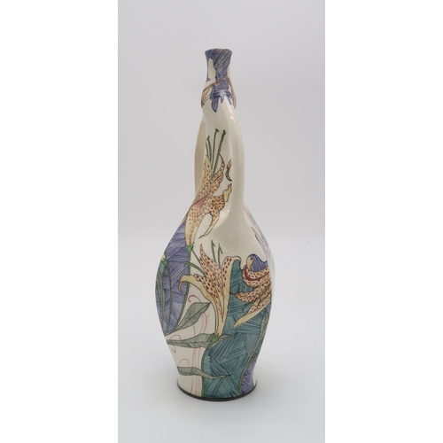 2152 - A GOUDA ZUID HOLLAND VASEof twin handled amphora form, decorated with lilies in line and dot style, ... 