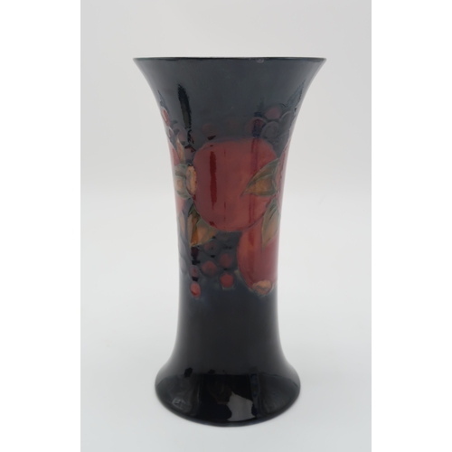 2157 - A MOORCROFT POMEGRANATE PATTERN VASE of flaring form, with impressed and green signature to base, 27... 
