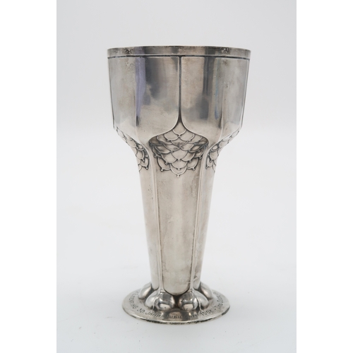 2456 - ORIVIT;A German silver Jugendstil vase, of flaring conical form, with stylised fruit decoration with... 