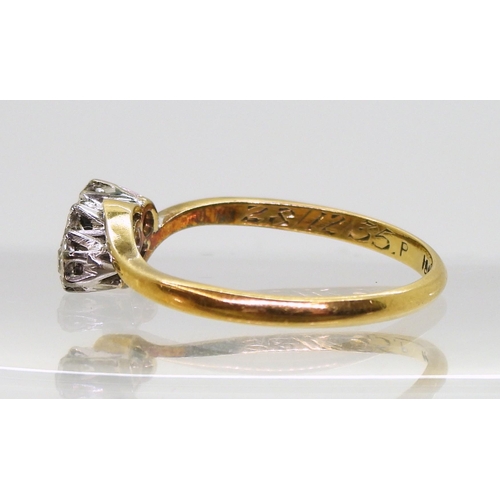 800 - An 18ct gold three-stone on a twist diamond ring, set with estimated approx 0.10cts brilliant cut, s... 