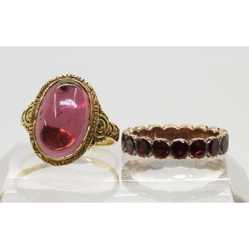 801 - A 14ct gold garnet ring, stamped 585 size approx M, weight 3.8gms, together with a rose-coloured met... 