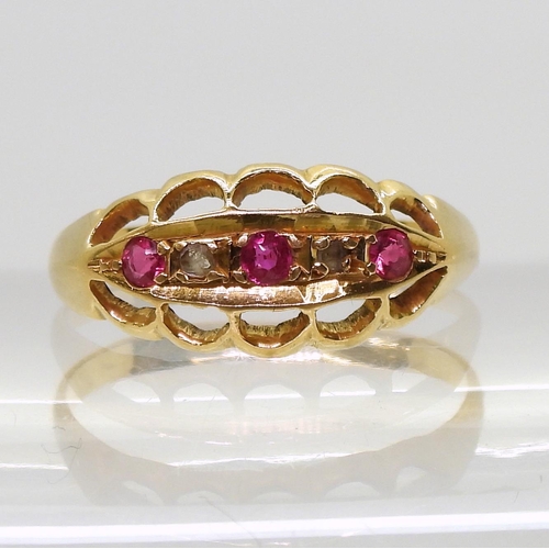 803 - A bright yellow metal red gem and rose cut diamond ring, size M1/2, weight 2.3gms