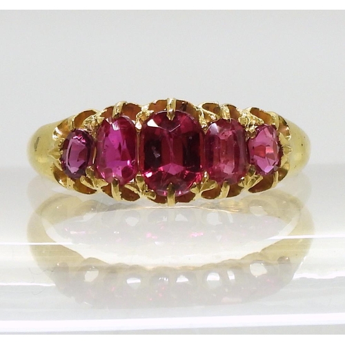 805 - A five stone ruby ring, largest ruby approx 5.3mm x 3.8mm x 2.4mm,  hallmarked 18ct, Birmingham 1904... 