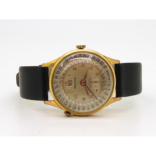 819 - A gold plated Palace Calendar watch, diameter of the case 3.3cm, weight with strap 35.8gms