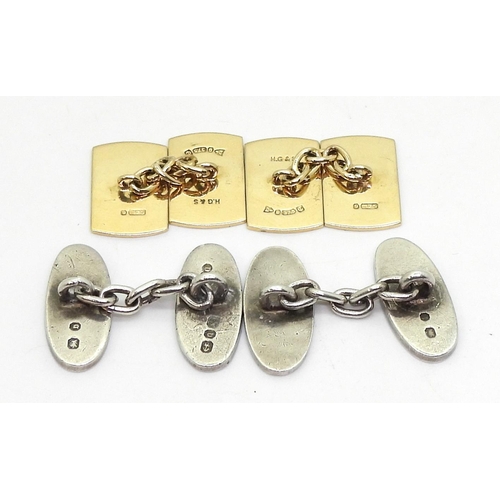 821 - A pair of 9ct gold cufflinks with engine turned engraving, weight , together with a pair of vintage ... 