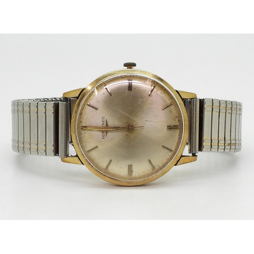 825 - A gents 9ct gold Longines wristwatch, hallmarked London 1968, movement stamped 13411580, diameter of... 