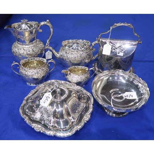 411 - A four piece silver-plated tea service, with engraved scrolling foliate decoration, with a shaped ri... 