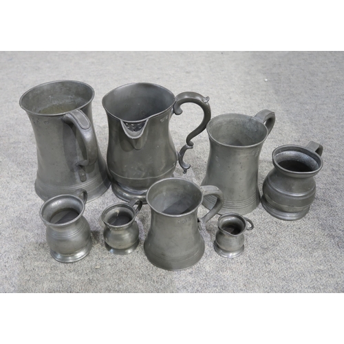 419 - A collection of pewter tankards