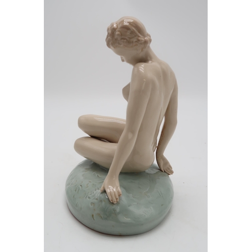 307 - Elly Strobach for Royal Dux, a glazed porcelain model of a reclining nude, height 22cm.