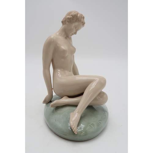 307 - Elly Strobach for Royal Dux, a glazed porcelain model of a reclining nude, height 22cm.