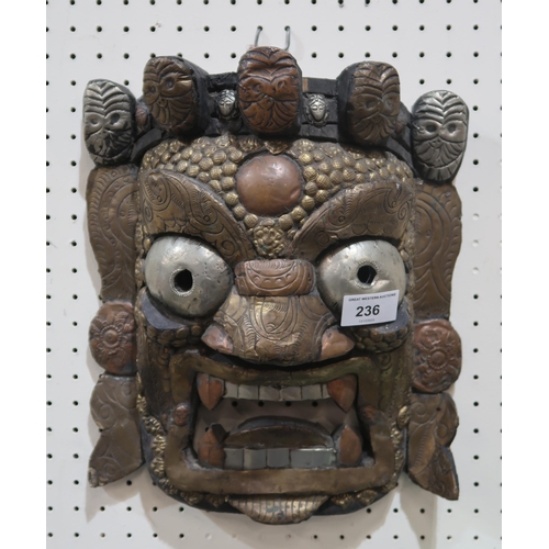 236 - A  tribal mask with metal decoration and a carved stick of snakeshead form (2)