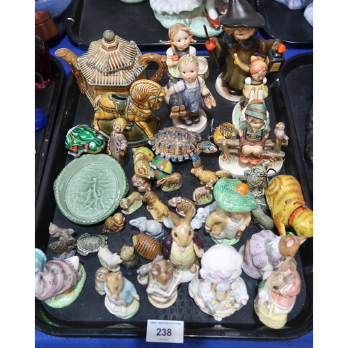 238 - Assorted Beatrix Potter figures, Hummel figures, Wade whimsies and assorted other items