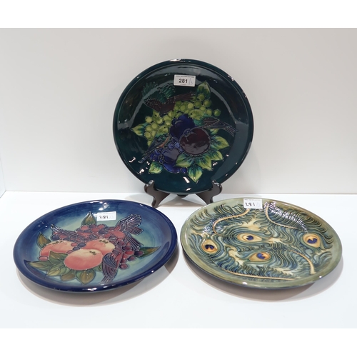 281 - Three Moorcroft plates in Finches, Green Finches and Phoenix patterns, all 25.5cm diameter