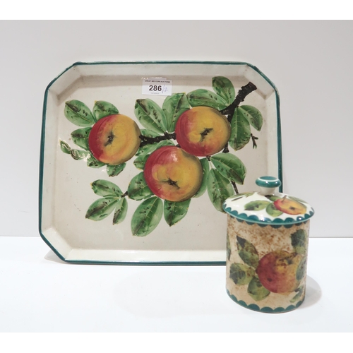 286 - A Wemyss Ware apple painted rectangular tray, together with a preserve pot (2)