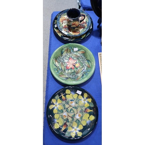 298 - Three Moorcroft plates including Sophie & Hyporicum, together with a 1999 Tigerlily plate and a ... 