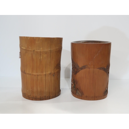 313 - Two carved bamboo brush pots, both decorated with scholars among forests and pavilions (2)