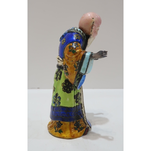 325A - A Chinese export silver and enamel figure of Shoulao, dressed in colourful enamels, with a removable... 