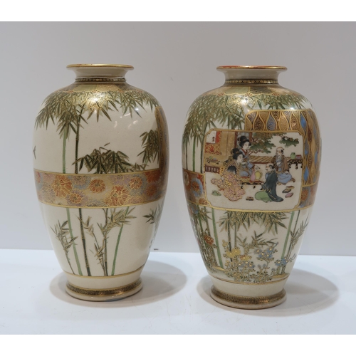 325C - A pair of Satsuma vases, by Choshuzan, of baluster form, decorated on a ground of bamboo, with vigne... 