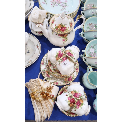 334 - A Royal Albert Old Country Roses teaset with teapot, six cups, saucers, plates, milk jug, sugar bowl... 