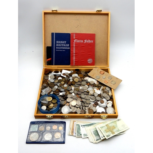 445 - Coins, Banknotes and Tokens.A collection of GB and worldwide coins in four collectors cases to inclu... 