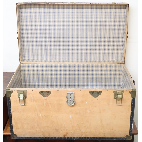 112 - A 20th century metal bound wood panel travel trunk, 53cm high x 91cm wide x 52cm deep