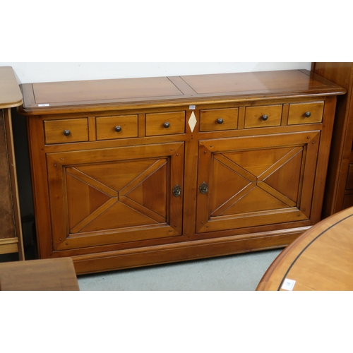 84 - A late 20th century French cherrywood Artcopi sideboard with two long drawers over pair of cabinet d... 