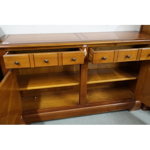 84 - A late 20th century French cherrywood Artcopi sideboard with two long drawers over pair of cabinet d... 