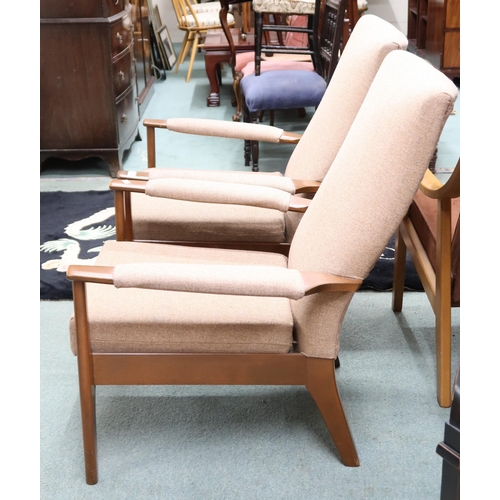 97 - A pair of mid 20th century teak Parker Knoll armchairs, 89cm high x 68cm wide x 82cm deep (2)