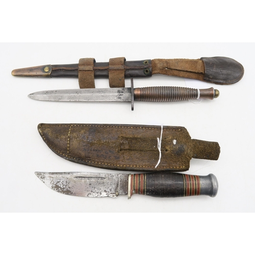 527 - A WW2 British Third Pattern Fairbairn-Sykes Commando fighting knife/dagger, housed in a metal-tipped... 