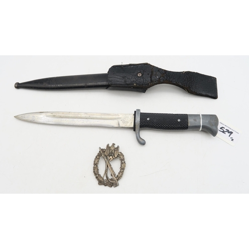 529 - A WW2 German Third Reich K98 parade bayonet by Krebs, Solingen, with moulded black plastic grip, the... 