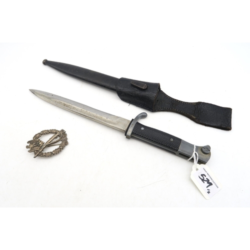 529 - A WW2 German Third Reich K98 parade bayonet by Krebs, Solingen, with moulded black plastic grip, the... 