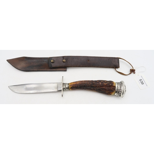 530 - An antler-handled hunting knife with continental silver mounts, the blade measuring approx. 15cm in ... 