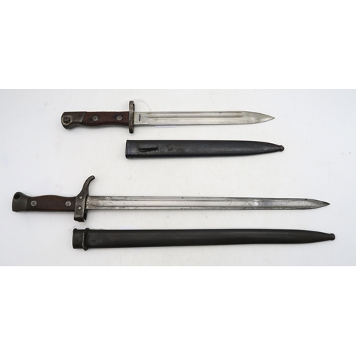 555 - A Siamese M1935 Mauser bayonet, the blade measuring approx. 25cm in length and housed in a steel sca... 