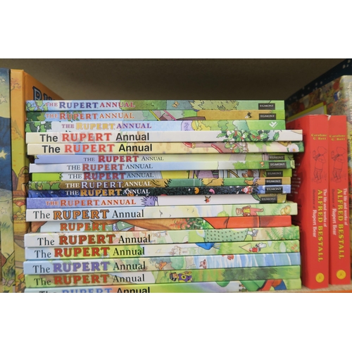 585A - A large collection of Rupert Bear Annuals, largely of fairly recent publication, together with some ... 