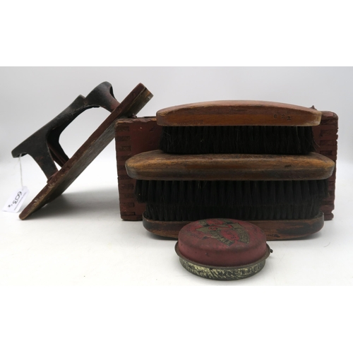 603 - A collection of wooden shoe lasts and a shoe shine kit with assorted brushes