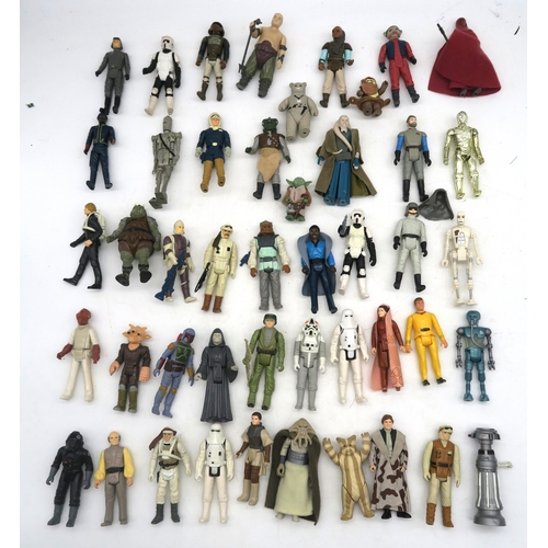 631 - A large collection of Star Wars small-scale action figures and related costume accessories, largely ... 