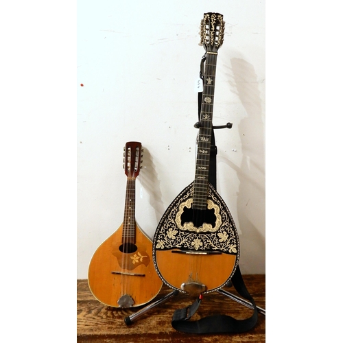 464 - A Portuguese 17 fret mandolin in a natural finish together with an Ecorda 24 fret bowl back bazouki