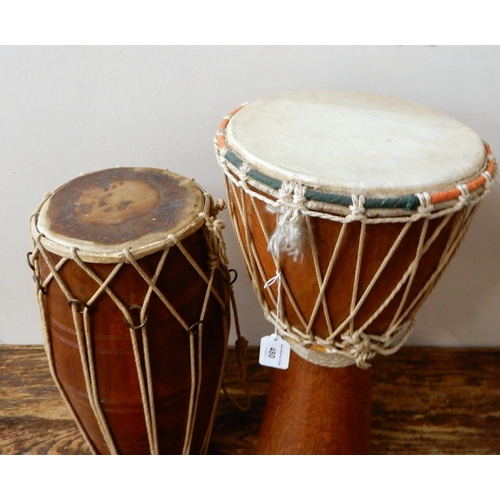 480 - African djembe drum together with a South Asian dhol  double-sided barrel drum