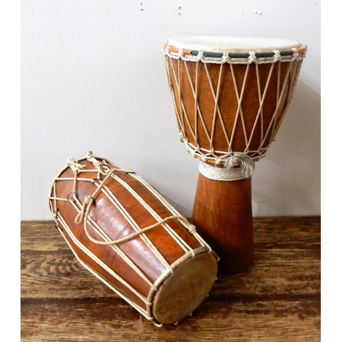 480 - African djembe drum together with a South Asian dhol  double-sided barrel drum