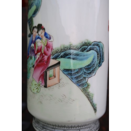 320 - A Chinese  rouleau vase, decorated with ladies and court figures within a pavilion, one fishing, wit... 