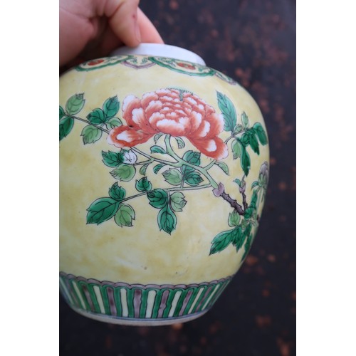 322 - A Chinese yellow-ground famille verte ginger jar, decorated with birds amongst rocks and flowers, wi... 