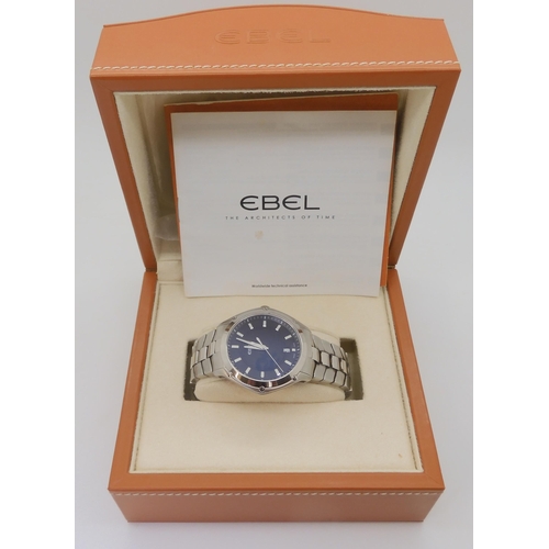 764 - A gents Ebel classic sport watch with a black dial, silver baton numerals and date aperture, with a ... 