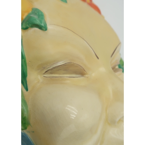 2160 - A CLARICE CLIFF FLORA WALL MASK circa 1936, relief moulded as a lady's face with floral hairband in ... 