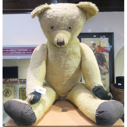 517 - A large mohair teddy bear, with articulated joints, standing approx. 77cm in height