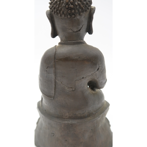 2357 - A CHINESE BRONZE MODEL OF BUDDHACast in typical design on a high lotus throne base, 21.5cm high, a b... 