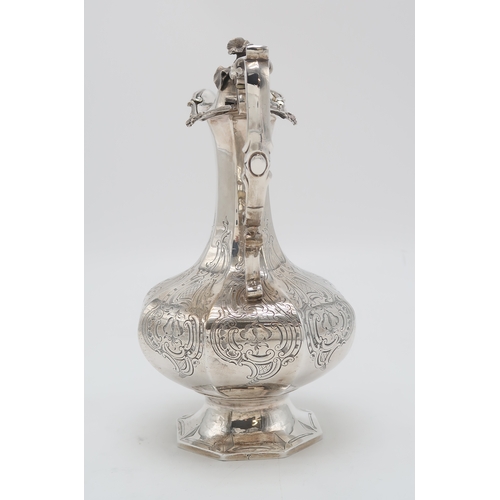 2460 - AN EARLY-VICTORIAN SILVER EWERby John & Henry Lias, London 1845, of faceted baluster form, engra... 