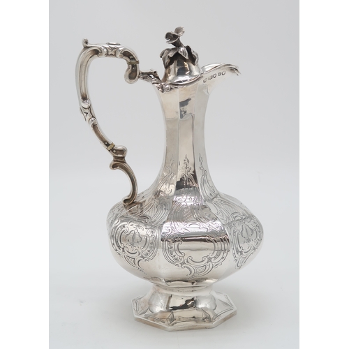 2460 - AN EARLY-VICTORIAN SILVER EWERby John & Henry Lias, London 1845, of faceted baluster form, engra... 