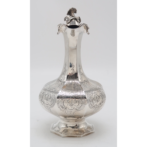 2460 - AN EARLY-VICTORIAN SILVER EWERby John & Henry Lias, London 1845, of faceted baluster form, engra... 