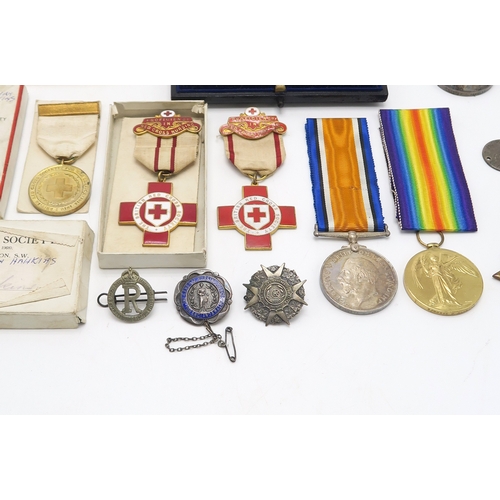 2551 - A COLLECTION OF WW1 NURSING MEDALS AND BADGES PERTAINING TO THREE SISTERS Comprising an R.R.C. medal... 